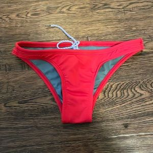 red jolyn swimsuit bottoms | size small (womens)